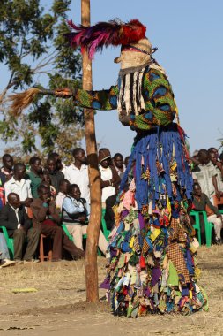 Traditional Nyau dancers with face mask