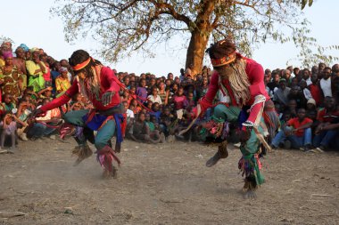 Traditional Nyau dancer with face mask