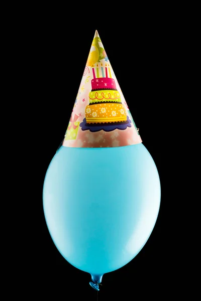 Balão engraçado colorido no fundo preto — Fotografia de Stock