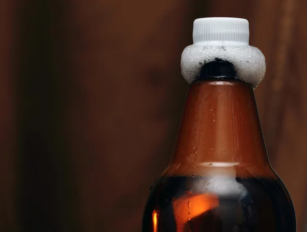 Plastic  Bottle of beer with vials — Stock Photo, Image