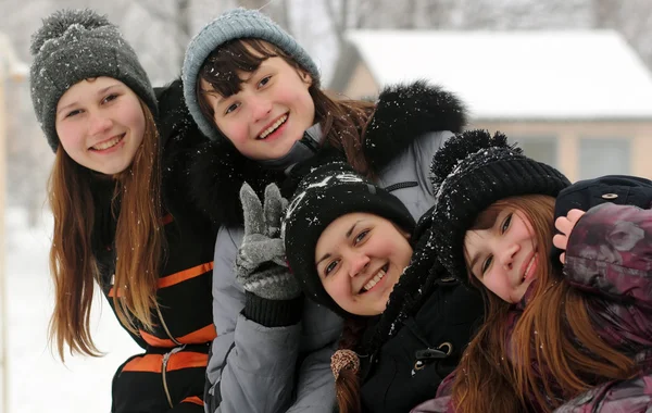 Friends in winter park. Snowy weather — Stock Photo, Image