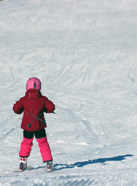 Little girl driving on skis — Stock Photo, Image