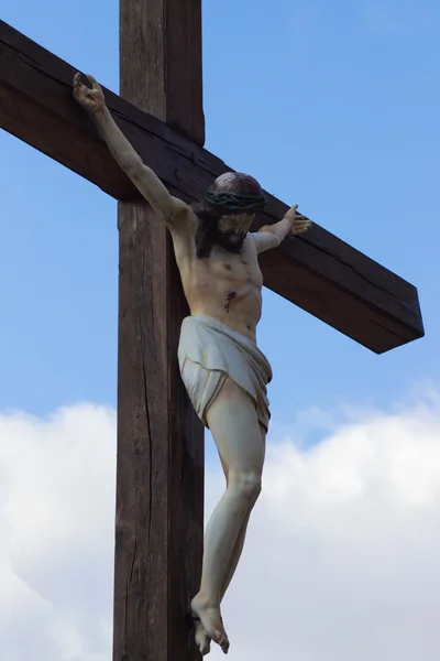 Socha Ježíše Krista na kříži. Těsných nahoru — Stock fotografie