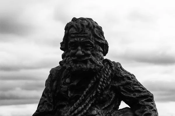 LVIV, UKRAINE - NOVEMBER 15, 2015: Sculpture a chimney sweep on the roof of the House of Legends on November 15, 2015 in Lviv, Ukraine. — Stock Photo, Image