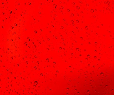 arka plan üzerinde kırmızı su damlaları