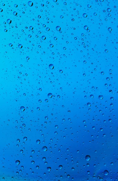 Fondo de gotas de agua sobre vidrio —  Fotos de Stock