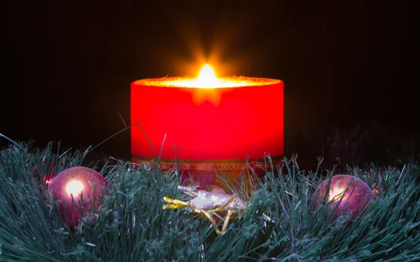 Красная свеча с огнем Стоковое Изображение