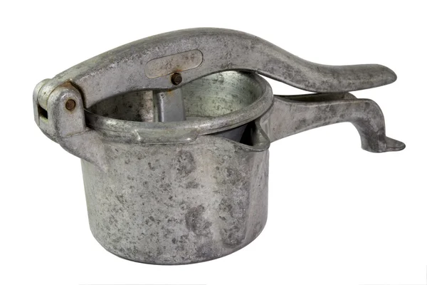 Beyaz arka plan üzerinde eski meyve sıkacağı.