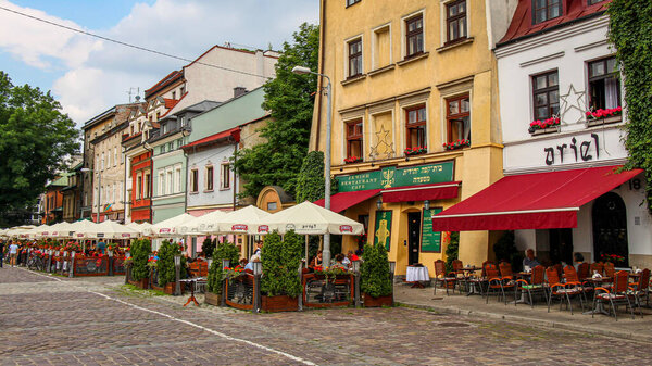 Krakow, Poland - July 29th 2018: Ariel Cafe, Restaurant and Gallery in Szeroka Street Square in Kazimierz, Jewish Quarter, Krakow, Poland