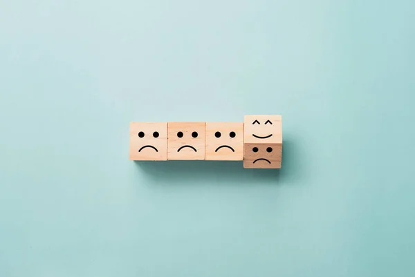 Flipping Wooden Cube Block Sad Smile Emotion Blue Background — Stock Photo, Image