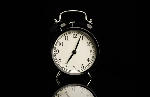 Black Alarm Clock Reflect Black Background Copy Space Royalty Free Stock Photos