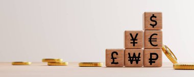 Dolar Yen Euro Pound gibi tahta blok üzerine ana küresel para birimi yazdırma ekranı ve 3 boyutlu döviz değişimi için altın paralar.