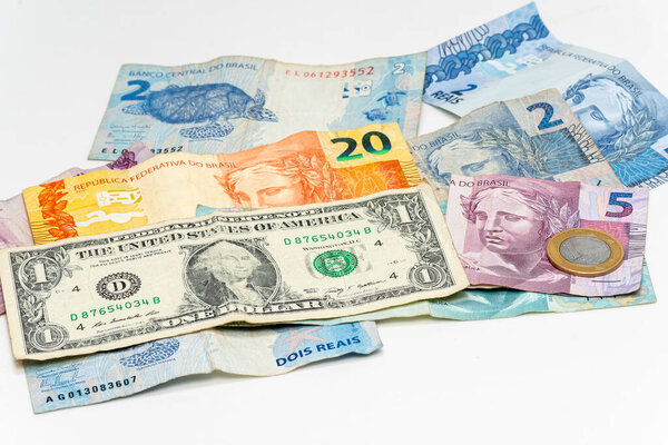 one dollar bill on Brazilian money notes, devaluation of Brazilian money