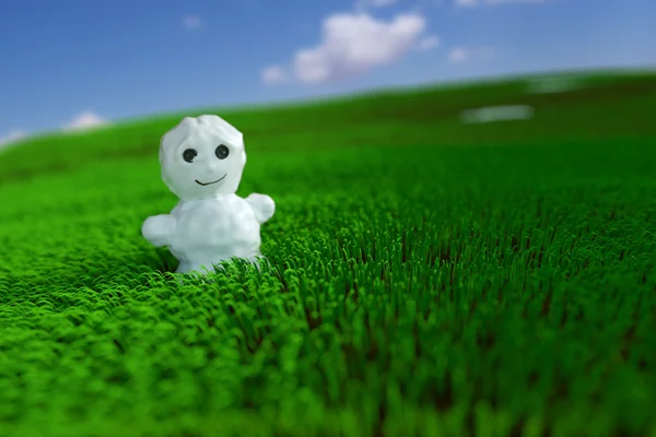 Snowman in the grass — Stock Photo, Image
