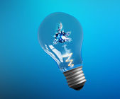 Explosion of ideas. Light bulb lamps on a colour background. Path included.