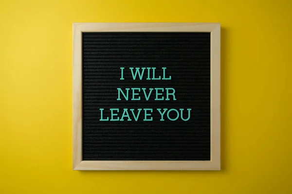 Never Leave You Sign Yellow Background — Stock Photo, Image