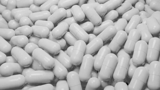 Primer plano de muchas cápsulas de píldoras blancas. Concepto de medicina y farmacia., Animación 3D. — Vídeo de stock