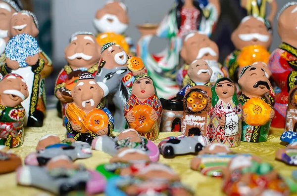 Traditional Ceramic Figurines Happy Uzbek Men Women National Clothes Bread Royalty Free Stock Photos