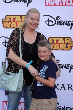 Melissa Peterman, Riley David Brady