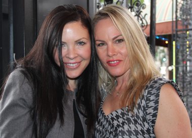 Christa Campbell, Christy Oldham 