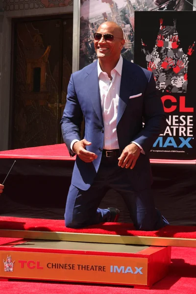 Dwayne “The Rock” Johnson with his cousin, who is also his stunt double