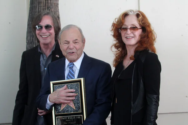 Jackson Browne, Joe Smith og Bonnie Raitt. - Stock-foto