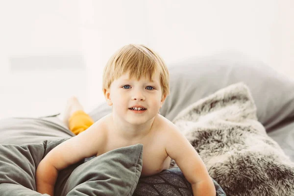 Cute Smiling Year Old Blond Boy Blue Eyes Lies Bed — Stock Photo, Image