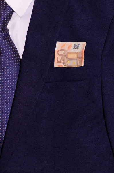 Affärsman kostym med pengar i fickan — Stockfoto