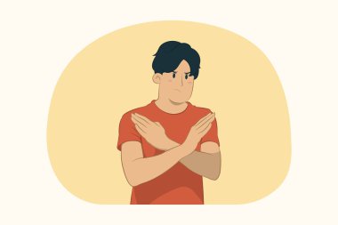 Çapraz el hareketleriyle dur hareketi yapan genç adam.