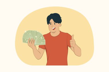 Nakit paranın hayranı genç bir adam başparmak kaldırma konseptini gösteriyor