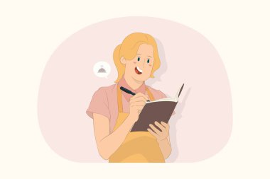 Genç aşçı kadın yemek tarifini yemek kitabına yazıp defter konseptine not alıyor.