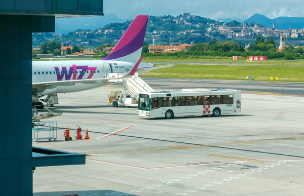 Aircraft Wizz Air aviation company at the airport of Bergamo.