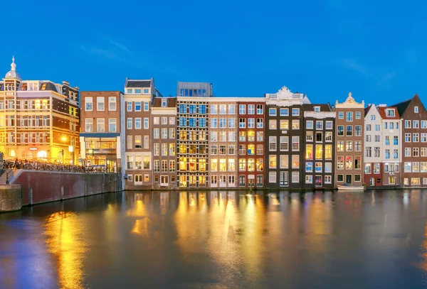 Amsterdam. Night view of the houses along the canal.