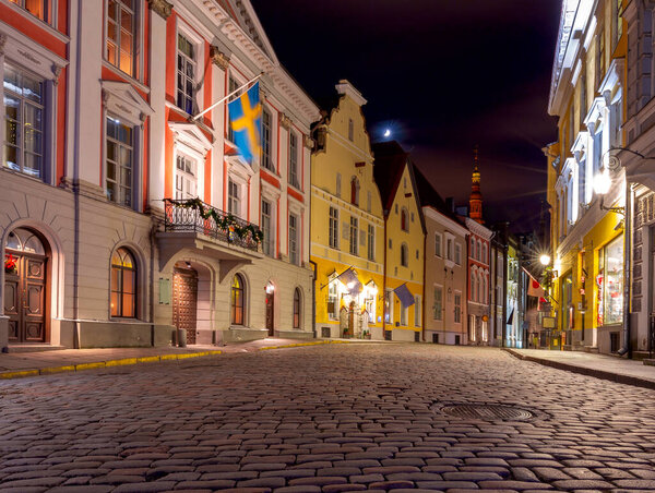 Old traditional medieval street in old Tallinn at night. Estonia.