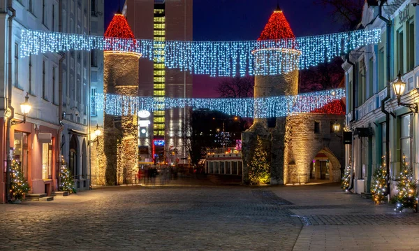 Tallinn. City gate on Viru street at night.