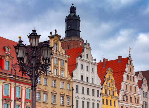 Multi-colored facades of medieval houses on the town hall square. Wroclaw. Poland.