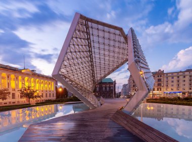 View of the Freedom Square and the city fountain at sunrise.