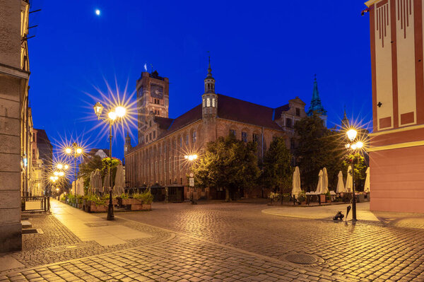 The Old Market Square and the City Hall at night. Torun. Poland.