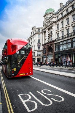 The iconic red Routemaster Bus in London clipart