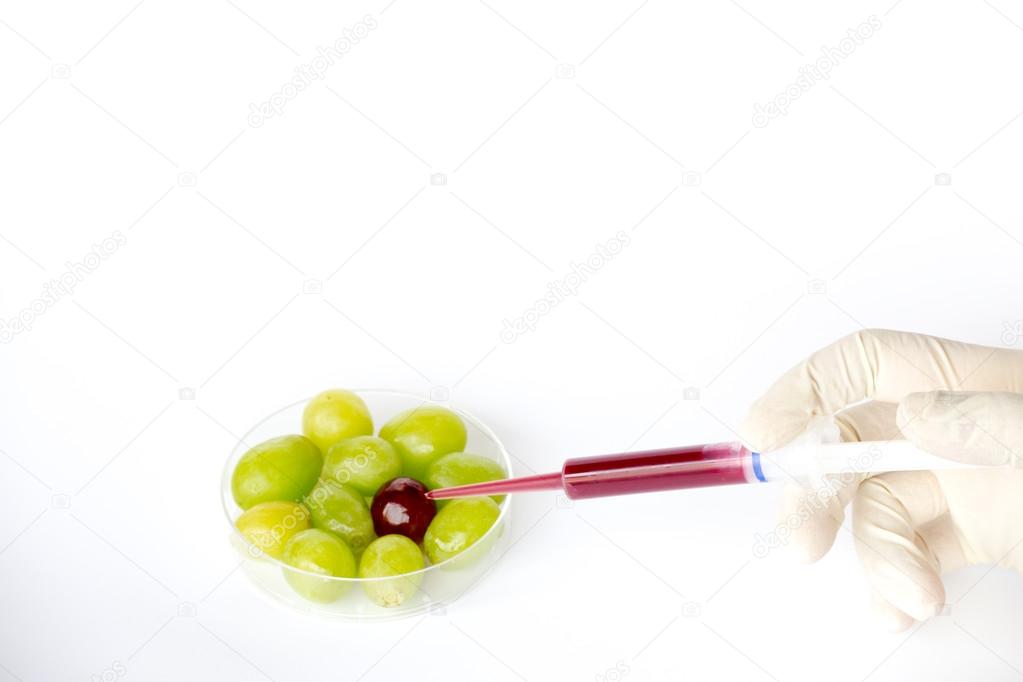 Converting green grapes into red grapes