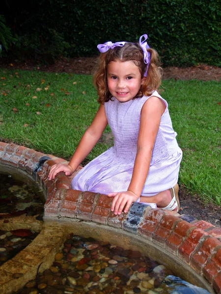 Young Girl Playing in Fountain — Stock Photo, Image