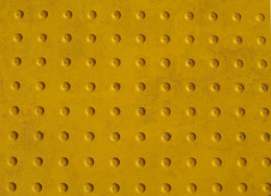 Grunge doku kaymaz desen bir kaldırımda sarı