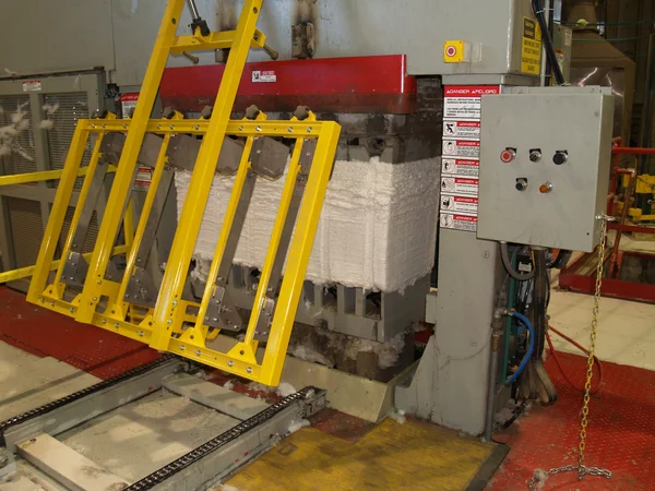 A cotton bale being built in the cotton bale press. — Stock Photo, Image