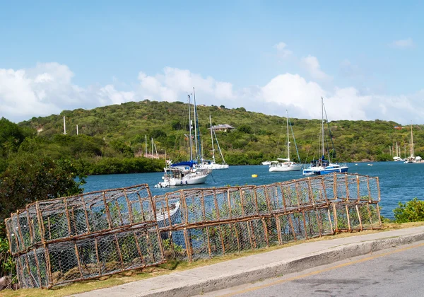 Lobster traps beside English Harbour in Nelsons Dockyard National Park, on Antigua Barbuda in the Caribbean Lesser Antilles West Indies. — Stock Photo, Image