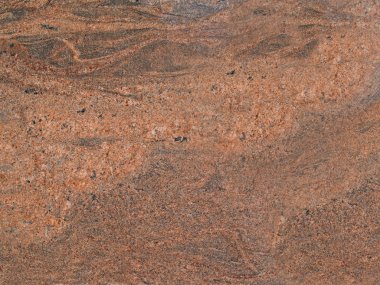 Rusty colored spotted marbled grunge background texture. clipart