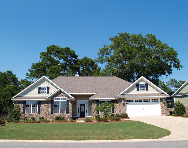 One story residential home with a stone  facade.