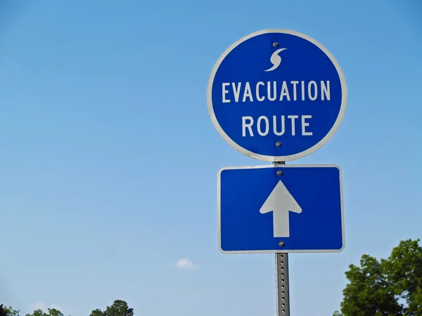 Blue hurricane evacuation route sign along a highway. Royalty Free Stock Images