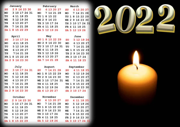 Calendar for 2022 with US holidays with a photo of a hot candle in the dark. Wall or desk calendar for 2022