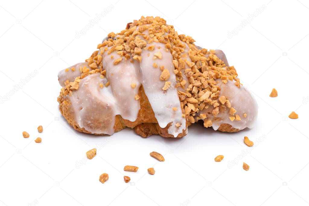 Tasty traditional polish Croissant of Saint Martin (Rogal Swietomarcinski) with white poppy seeds and nuts isolated on a white background.