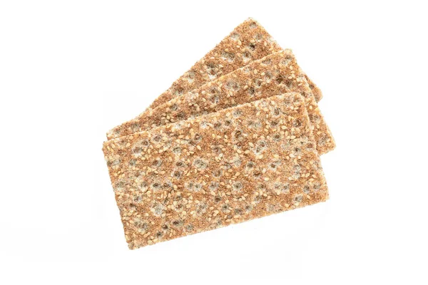 Stos Suchego Chrupiącego Chleba Pełnoziarnistego Sezamem Izolowanym Białym Tle Zbliżeniu — Zdjęcie stockowe